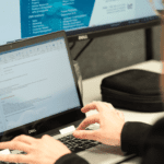 Akita consultant working on computer